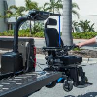 Shown Loading Chair into Pickup Bed